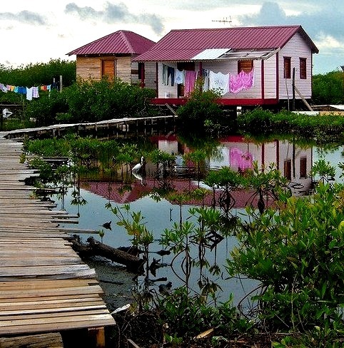 by David C on Flickr.Swamp House in Belize lagoon.