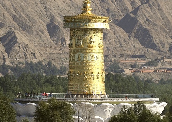 A very large prayer wheel along the shores of Yellow River, Tibet